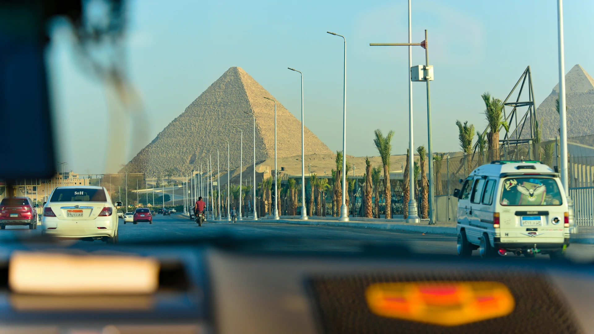 Ain Sokhna, Egypt - Great pyramids of giza seen from a moving car.