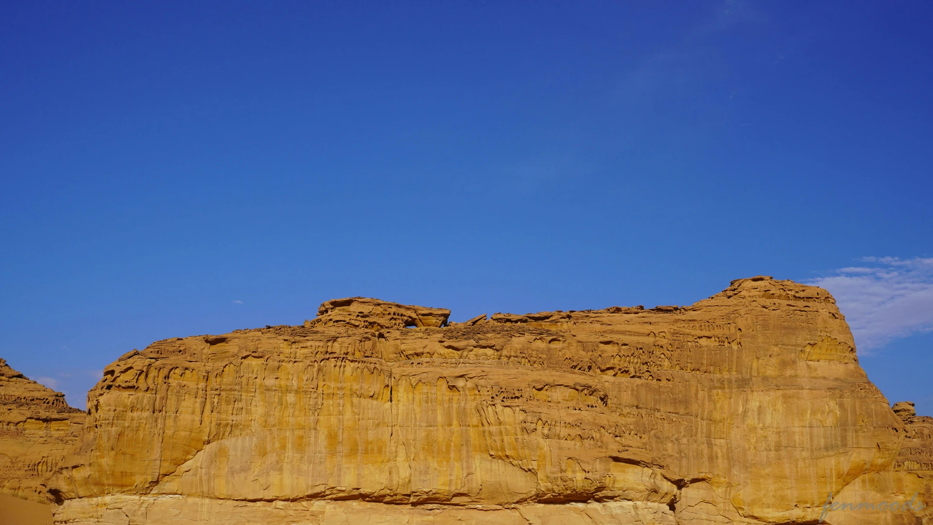 Aswan, Egypt - Stunning desert rock formation with a clear blue sky, showcasing the beauty of natural landmarks.