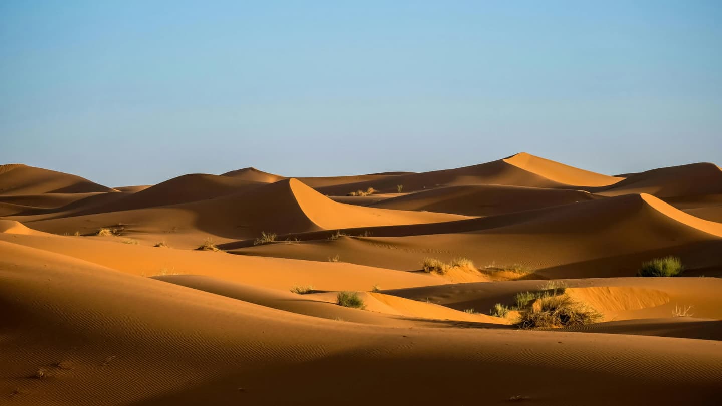 Dahab, Egypt - Scenic view of sahara desert sand dunes in morocco showcasing natural beauty and tranquility.