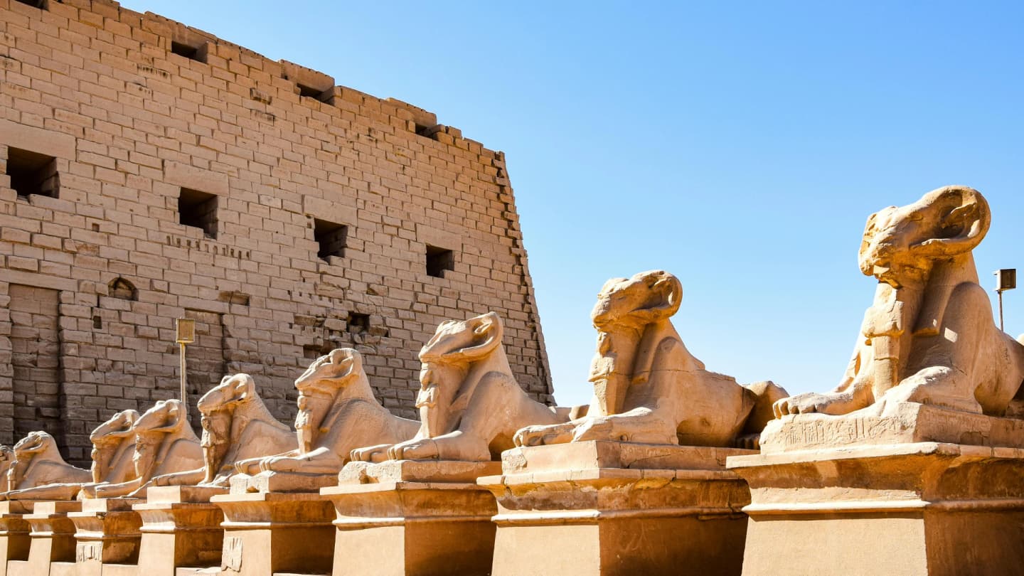 Marsa Alam, Egypt - Row of ancient sphinx statues at the historic karnak temple complex in luxor, egypt.