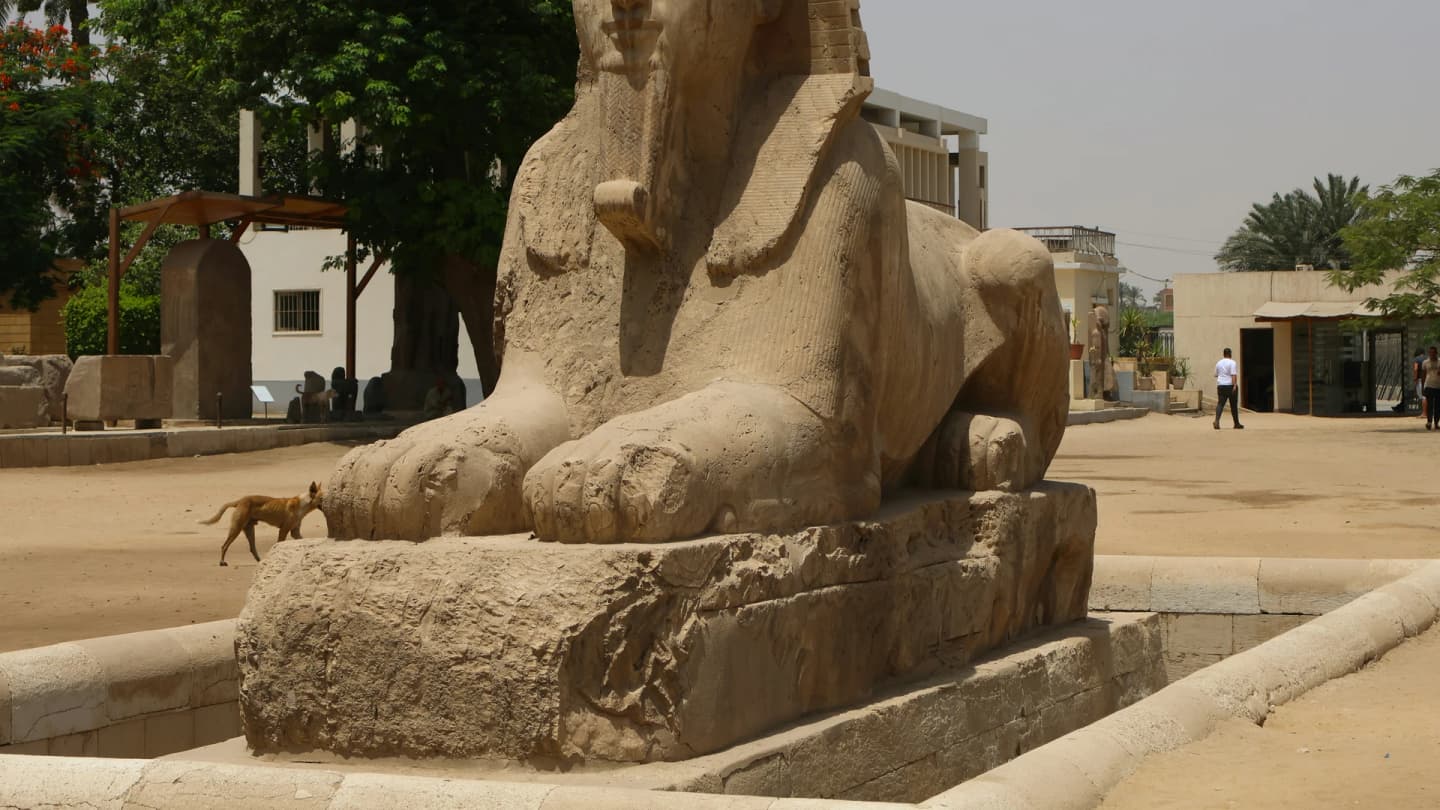 Safaga, Egypt - Statue of a seated sphinx in a courtyard