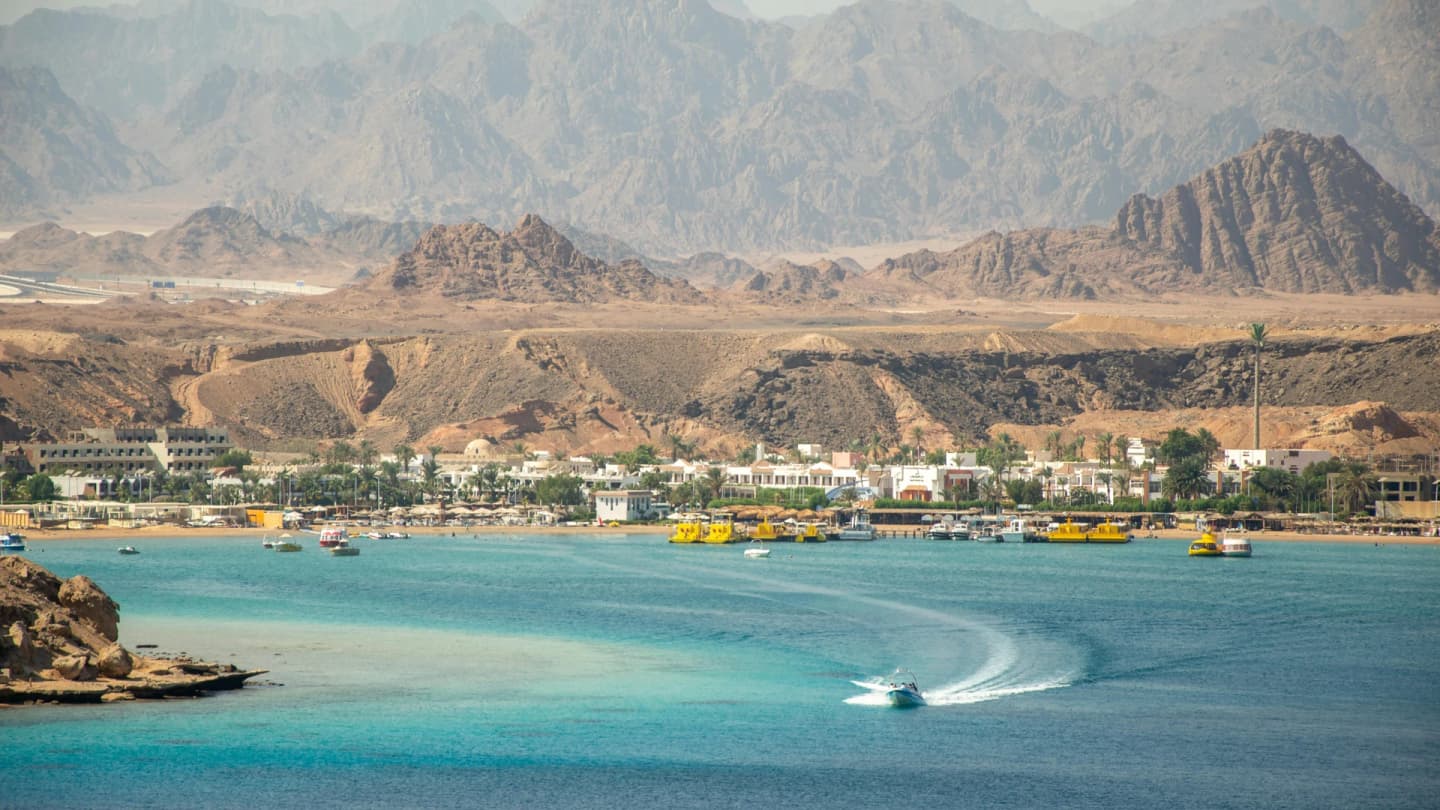 Soma Bay, Egypt - Stunning seaside town with turquoise waters and rugged mountains.
