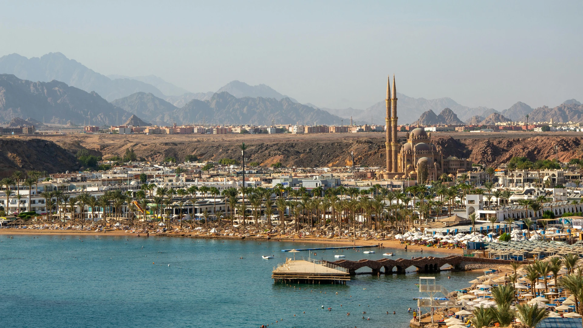South Sinai, Egypt - Stunning aerial view of sharm el sheikh featuring the coastline and city landmarks against a mountainous backdrop.
